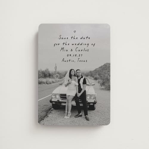 This is a noir save the date magnets with standard by Olivia Raufman called noted printing on magnet paper in magnet
