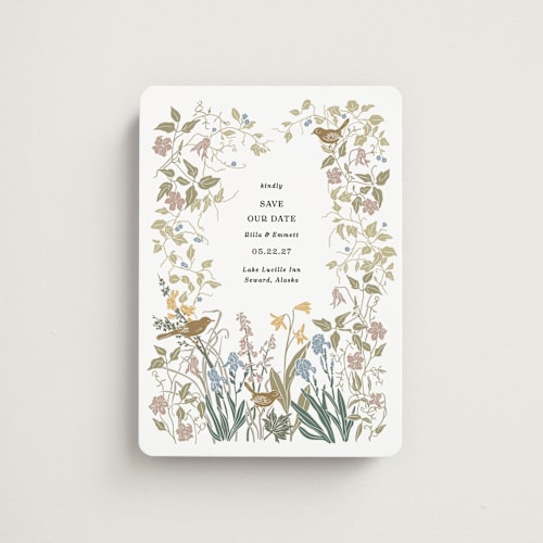 This is a mauve save the date magnets with standard by Cedar and Grey called wild clematis printing on magnet paper in magnet
