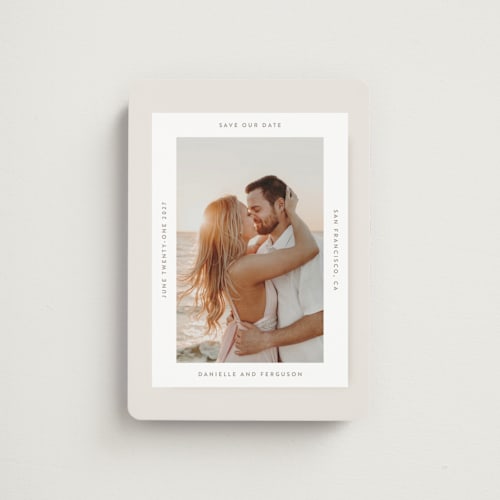 This is a ivory save the date magnets with standard by Tamara Hilje called horizonte printing on magnet paper in magnet