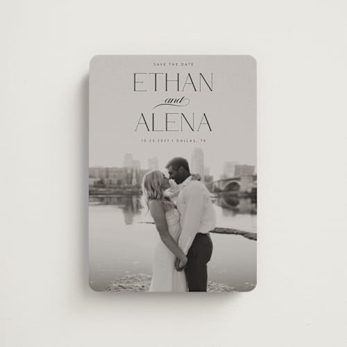 This is a ebony save the date magnets with standard by Maja Cunningham called all our love printing on magnet paper in magnet