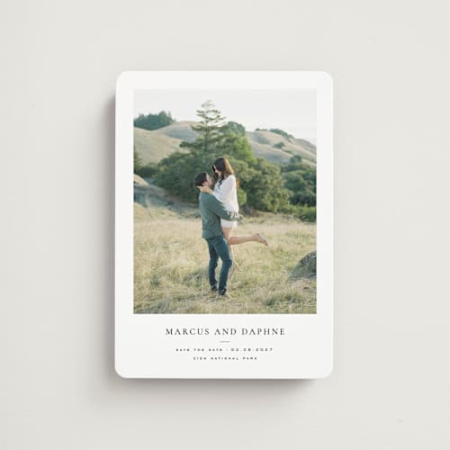 This is a ink save the date magnets with standard by Wildfield Paper Co called daisies printing on magnet paper in magnet