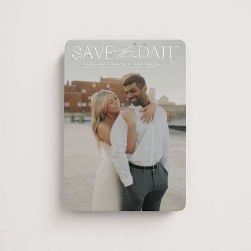 This is a ivory save the date magnets with standard by Maja Cunningham called prose printing on magnet paper in magnet