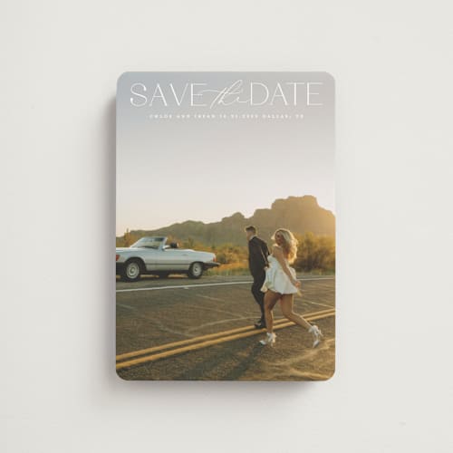 This is a ivory save the date magnets with standard by Maja Cunningham called prose printing on magnet paper in magnet