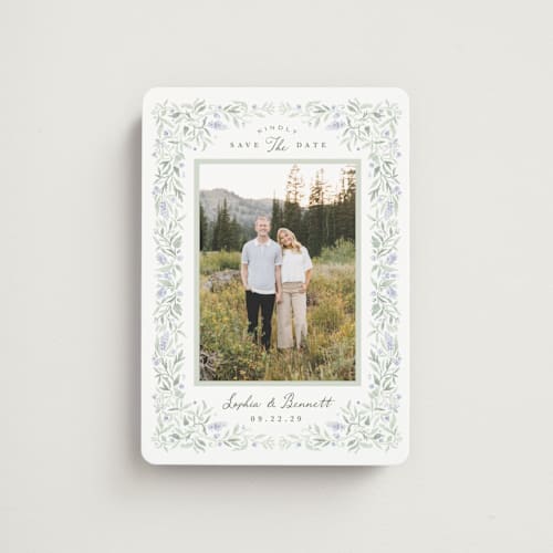 This is a periwinkle save the date magnets with standard by Kristen Smith called delicate vines printing on magnet paper in magnet