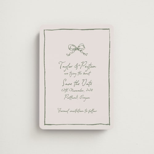 This is a moss save the date magnets with standard by Cass Loh called ribbon bow drawing printing on magnet paper in magnet
