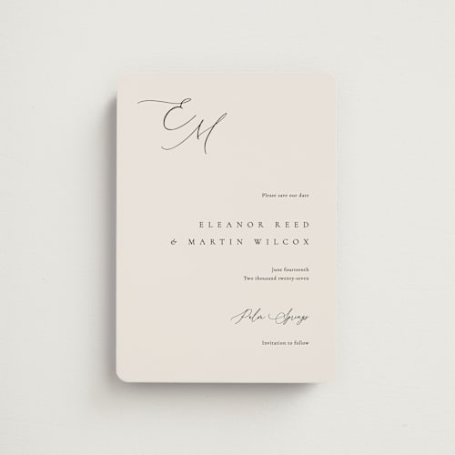 This is a linen save the date magnets with standard by Kelly Schmidt called corner printing on magnet paper in magnet