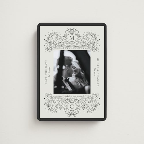 This is a latte save the date magnets with standard by Jackie Crawford called ornate sketched frame printing on magnet paper in magnet