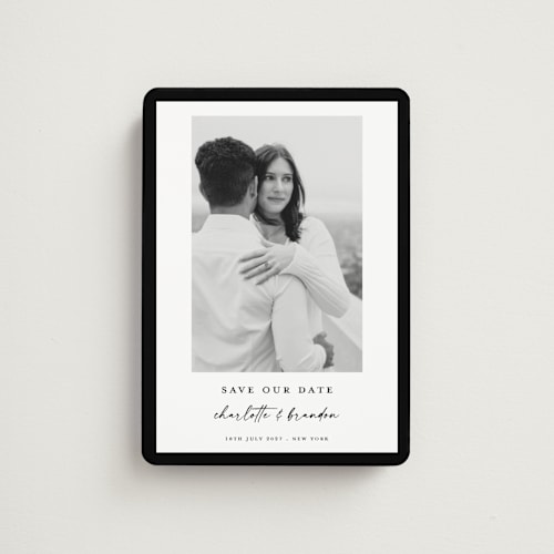 This is a onyx save the date magnets with standard by Devika Keskar called main event printing on magnet paper in magnet