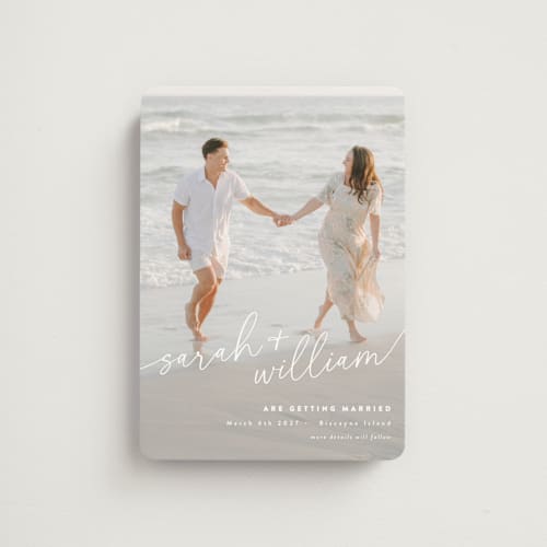 This is a ivory save the date magnets with standard by Jessie Steury called sweet script printing on magnet paper in magnet