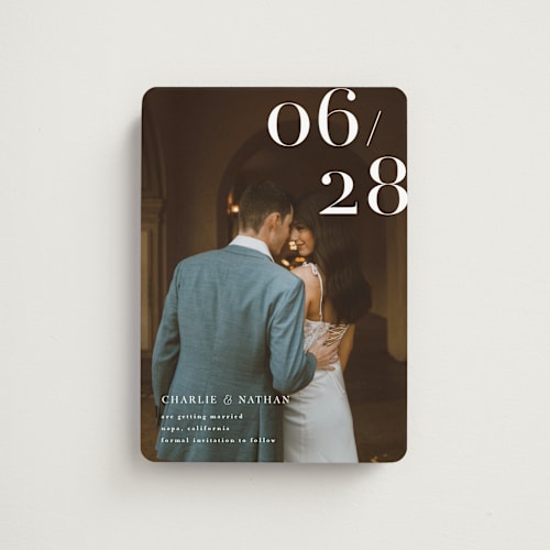 This is a pearl save the date magnets with standard by Shannon Chen of Four Wet Feet Studio called our big date printing on magnet paper in magnet