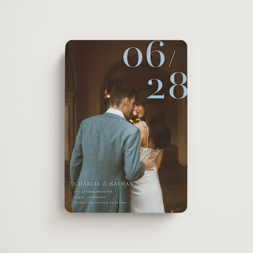 This is a something blue save the date magnets with standard by Shannon Chen of Four Wet Feet Studio called our big date printing on magnet paper in magnet