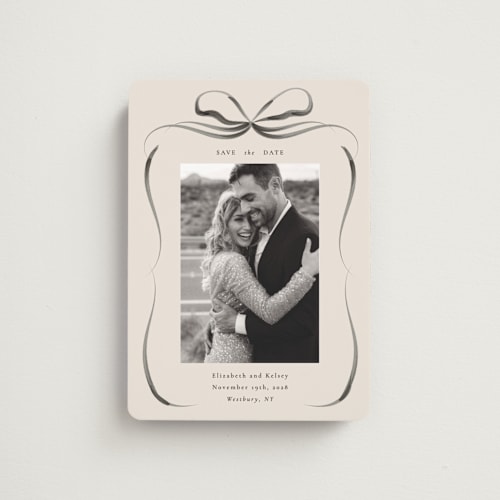 This is a tuxedo save the date magnets with standard by Corinne Malesic called bow printing on magnet paper in magnet
