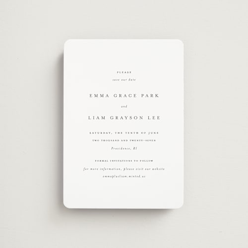 This is a classic white save the date magnets with standard by Design Lotus called a thousand years printing on magnet paper in magnet