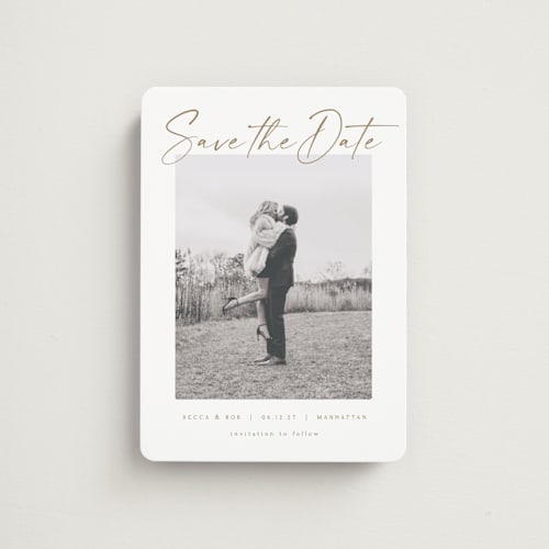 This is a ivory save the date magnets with standard by AK Graphics called flash dance printing on magnet paper in magnet