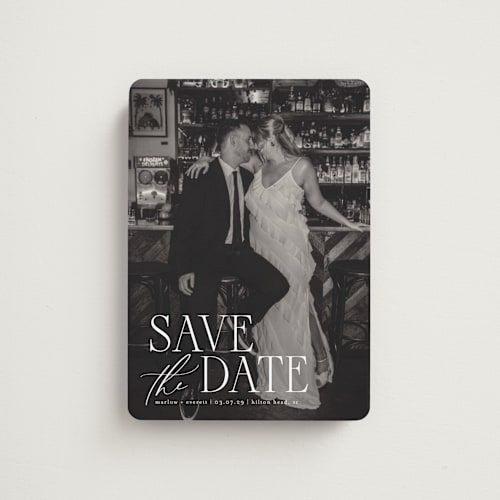This is a silk save the date magnets with standard by Kelly Schmidt called scripted initials printing on magnet paper in magnet
