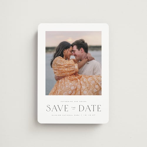 This is a ink save the date magnets with standard by Wildfield Paper Co called glacier printing on magnet paper in magnet