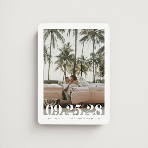 This is a linen save the date magnets with standard by Ashley Cuccio called malibu dreams printing on magnet paper in magnet