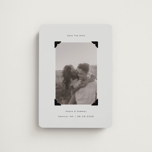 This is a cream save the date magnets with standard by Jenny Millington called scrapbook frame printing on magnet paper in magnet