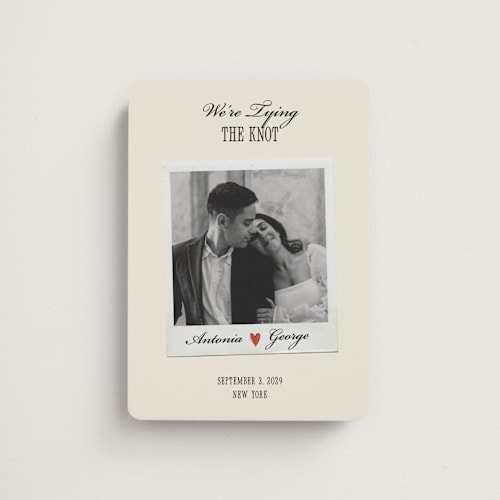 This is a lily save the date magnets with standard by Pati Cascino called two hearts printing on magnet paper in magnet