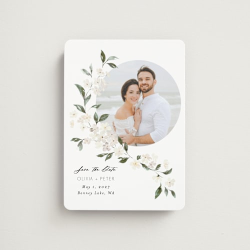 This is a porcelain save the date magnets with standard by Itsy Belle Studio called sweeping vine printing on magnet paper in magnet