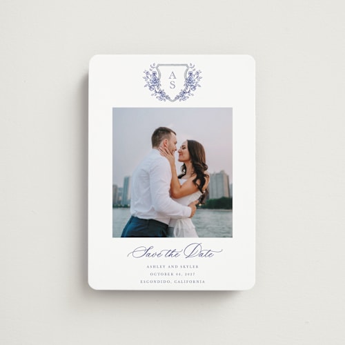 This is a dusty blue save the date magnets with standard by Cass Loh called watercolor flowers crest printing on magnet paper in magnet