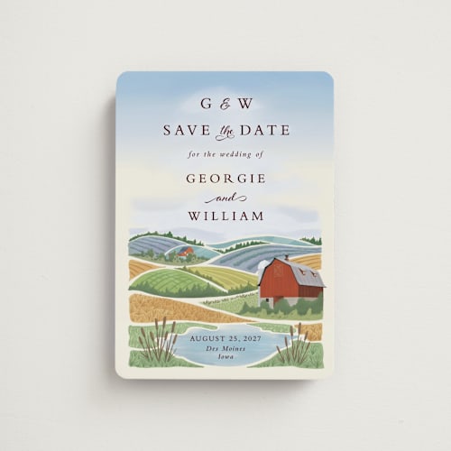 This is a sky blue save the date magnets with standard by Paper Sun Studio called farm and field printing on magnet paper in magnet