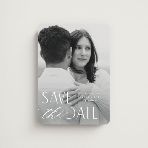 This is a snow save the date magnets with standard by Pixel and Hank called yours forever printing on magnet paper in magnet