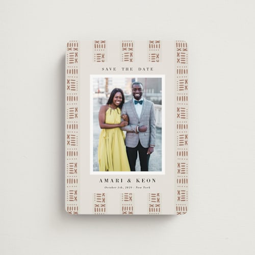This is a ivory save the date magnets with standard by Oma N. Ramkhelawan called amari printing on magnet paper in magnet