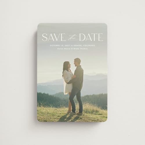 This is a cloud save the date magnets with standard by Kate Ahn called monterosso printing on magnet paper in magnet