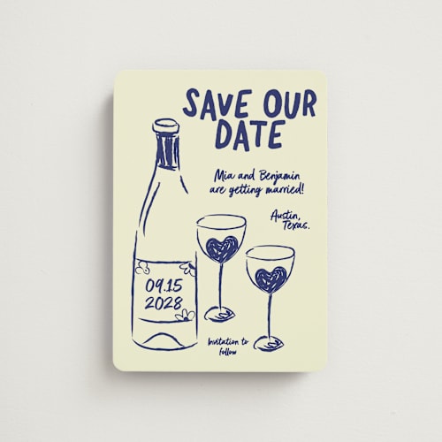 This is a denim save the date magnets with standard by Helena Vitto called heart of glass printing on magnet paper in magnet