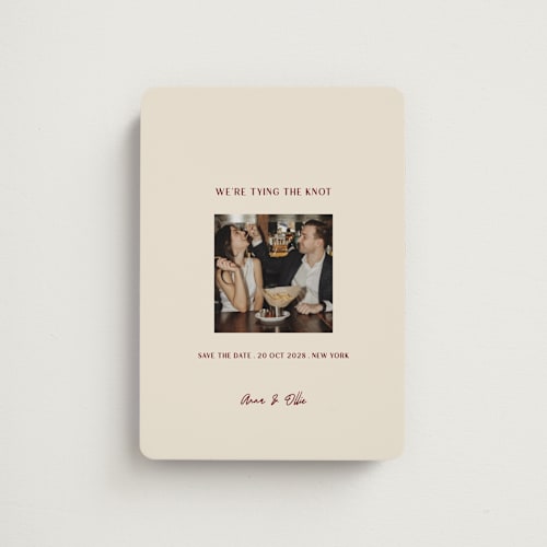 This is a burgundy save the date magnets with standard by Ani Somi called center cut printing on magnet paper in magnet