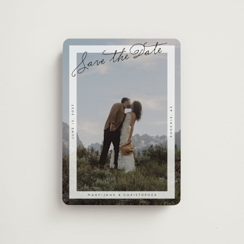 This is a porcelain save the date magnets with standard by lulu and isabelle called postcard perfect printing on magnet paper in magnet