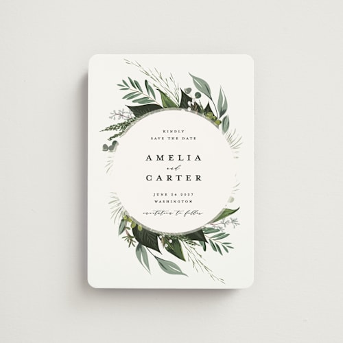 This is a ivory save the date magnets with standard by Susan Moyal called natures greens printing on magnet paper in magnet