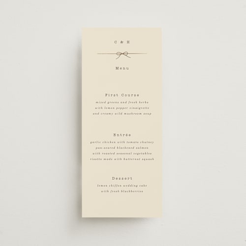This is a ivory menu cards with foil pressed by Baumbirdy called bow tie printing on signature in 4x9