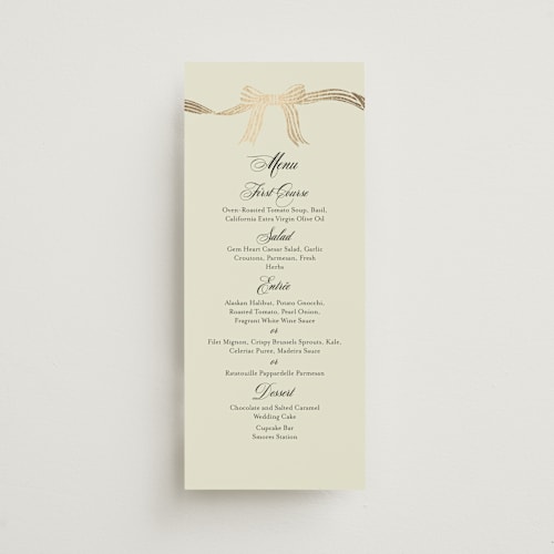 This is a champagne menu cards with foil pressed by Chris Griffith called all tied up printing on signature in 4x9