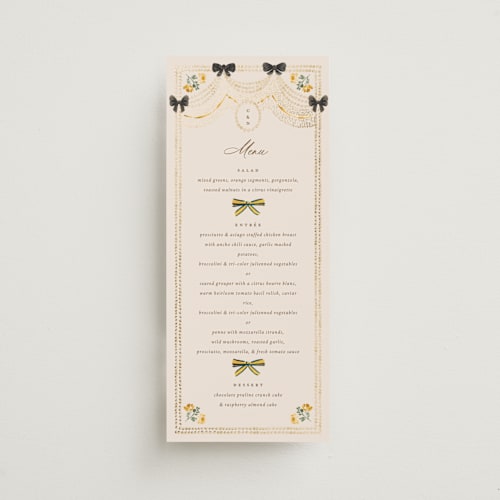 This is a golden menu cards with foil pressed by Claudia Orengo called tuileries printing on signature in 4x9