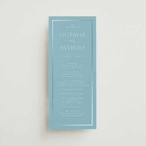 This is a sky unique wedding programs with foil pressed by Nicole Walsh called regal printing on signature in 4x9