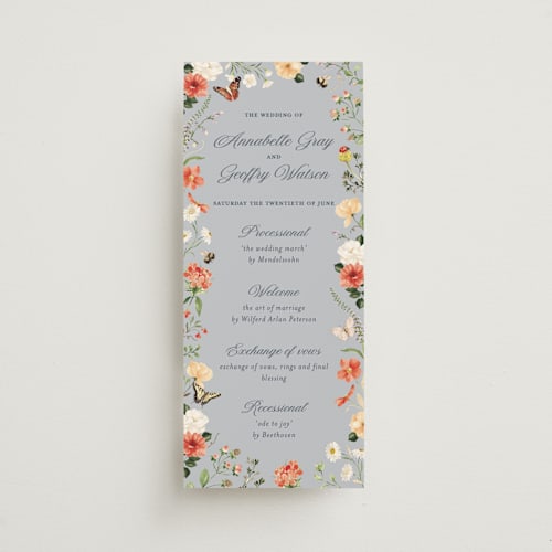 This is a something blue unique wedding programs with foil pressed by Sarah Knight called fleur printing on signature in 4x9