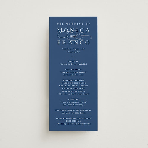 This is a royal blue unique wedding programs with foil pressed by Hooray Creative called and centered printing on signature in 4x9