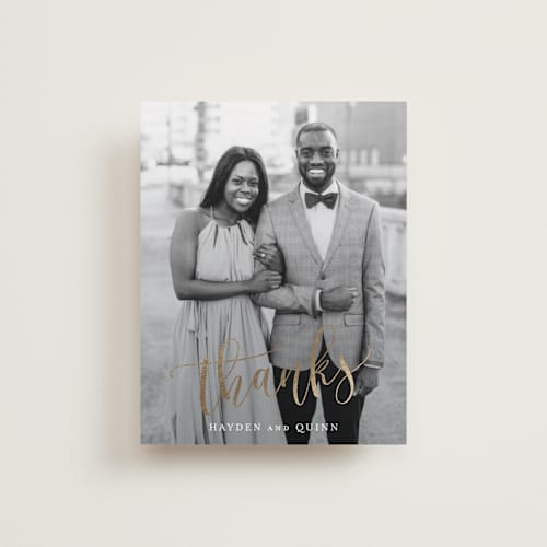 This is a gold wedding thank you cards with foil pressed by Hooray Creative called celebration script printing on recycled smooth signature in standard