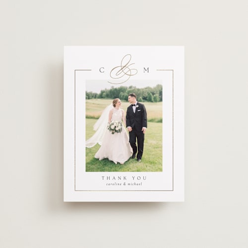 This is a silk wedding thank you cards with foil pressed by Kelly Schmidt called framed monogram printing on recycled smooth signature in standard