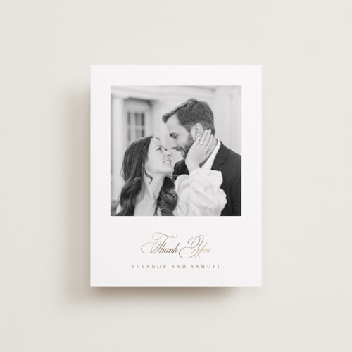 This is a ivory wedding thank you cards with foil pressed by Mansi Verma called gold crest printing on recycled smooth signature in standard