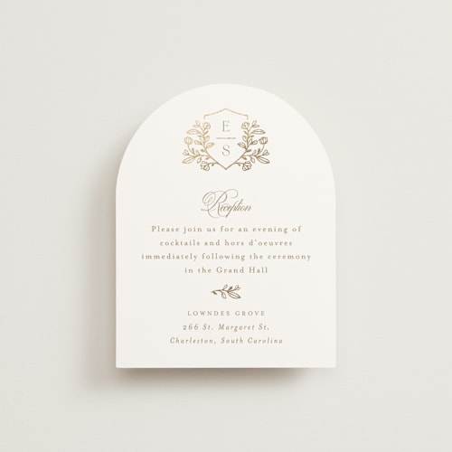 This is a ivory foil stamped wedding invitations with foil pressed by Mansi Verma called gold crest printing on signature in standard