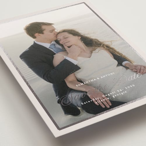 This is a antique foil stamped save the date cards with foil pressed by Nicole Walsh called tux printing on recycled smooth signature in standard