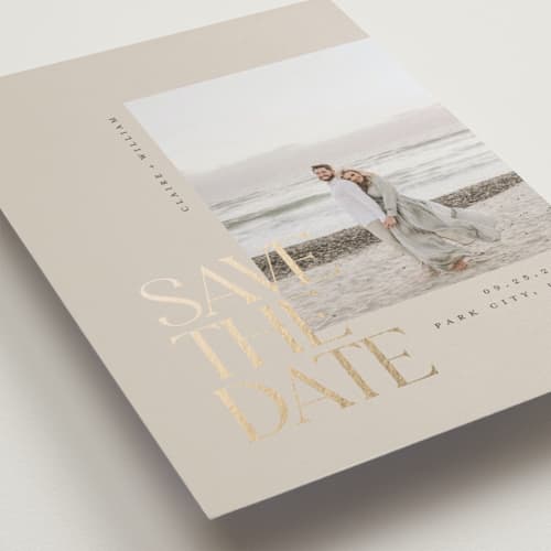 This is a sand foil stamped save the date cards with foil pressed by Robert and Stella called savoy printing on recycled smooth signature in standard