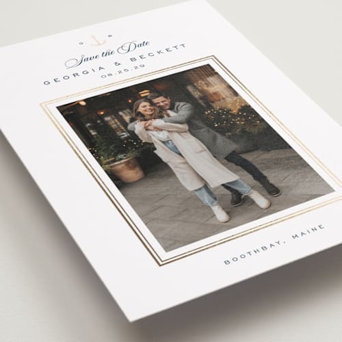 This is a royal navy foil stamped save the date cards with foil pressed by Olivia Raufman called anchored printing on recycled smooth signature in standard