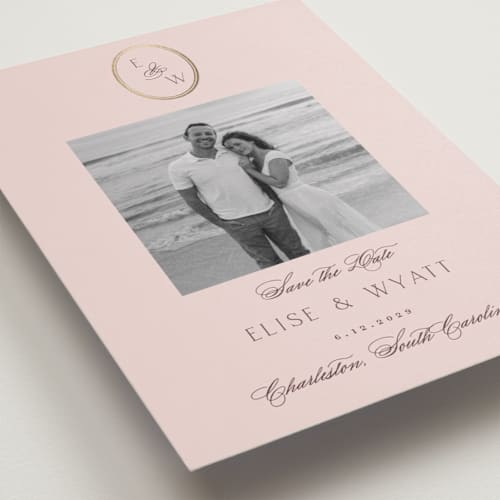 This is a rose quartz foil stamped save the date cards with foil pressed by Emily Betts called scallop monogram printing on recycled smooth signature in standard