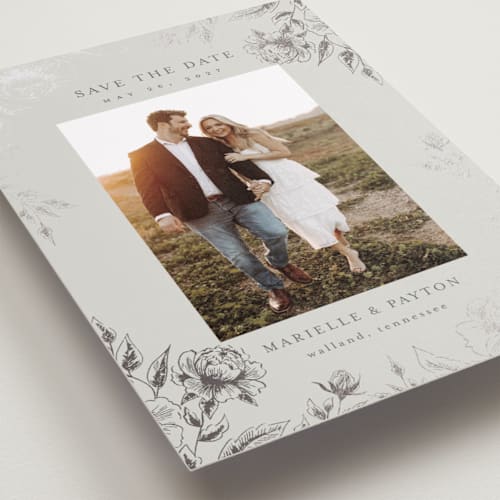This is a steel foil stamped save the date cards with foil pressed by Chris Griffith called wildflower date printing on recycled smooth signature in standard