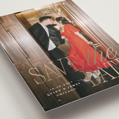 This is a snow foil stamped save the date cards with foil pressed by Pixel and Hank called love song printing on recycled smooth signature in standard