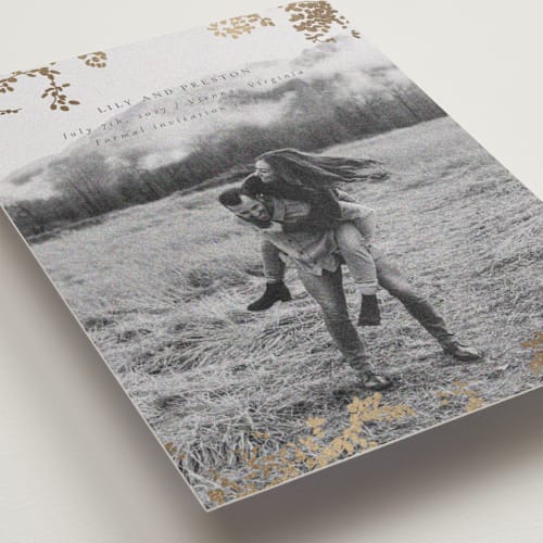 This is a charcoal foil stamped save the date cards with foil pressed by Design Lotus called forever and a day printing on recycled smooth signature in standard